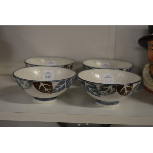 545 - A set of four Japanese studio pottery bowls.