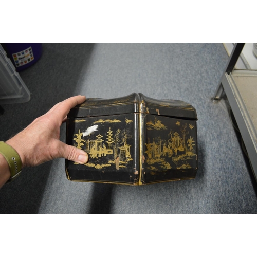 589 - A chinoiserie decorated black lacquer hexagonal shaped box and cover.