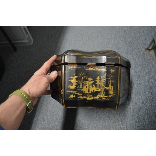 589 - A chinoiserie decorated black lacquer hexagonal shaped box and cover.