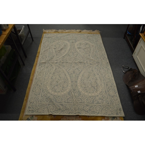 599 - An Oka embroidered throw.