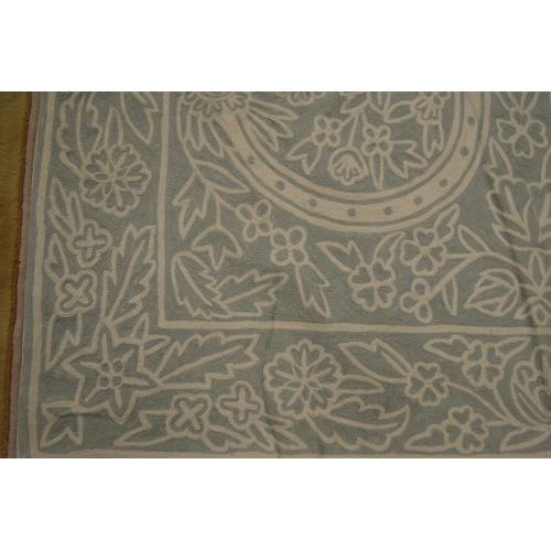 599 - An Oka embroidered throw.