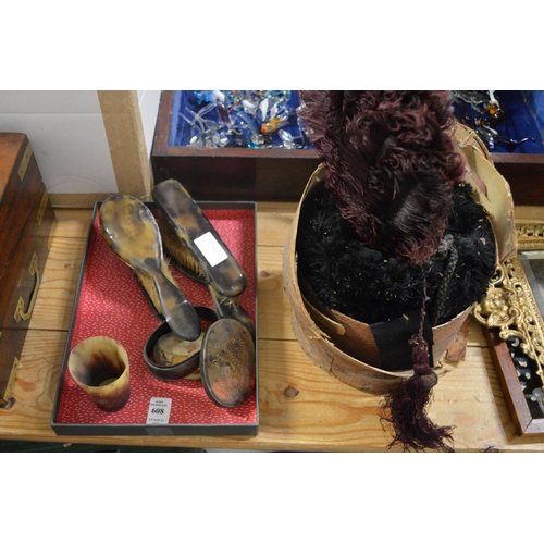 608 - A horn cup, dressing table items, a muff and a fan.