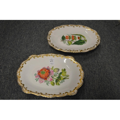 673 - A pair of floral decorated comports.