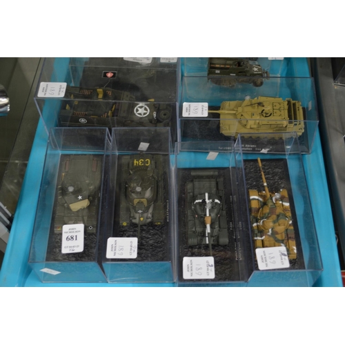 681 - Six various die cast tanks and trucks, in a perspex case.