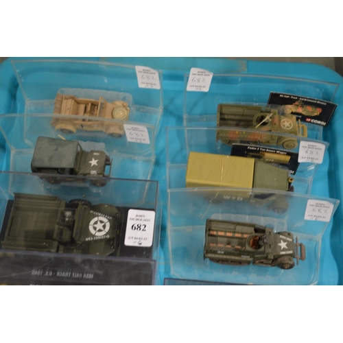 682 - Six various die cast armoured vehicles, in a perspex case.