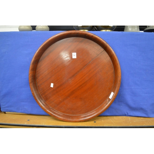 741 - A mahogany circular tray.