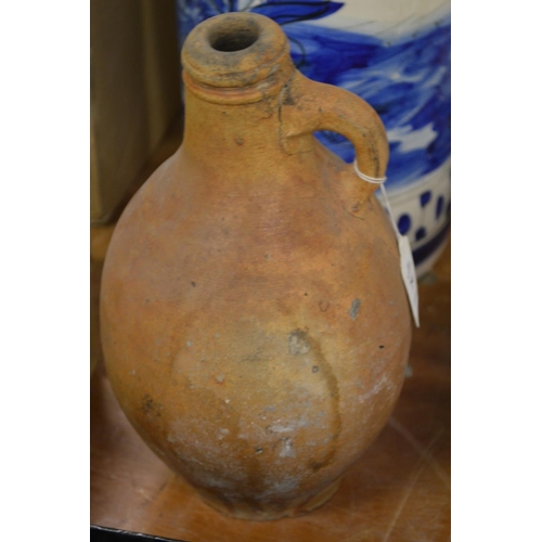 754 - An old stoneware flagon.