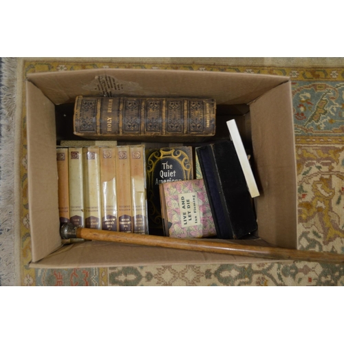 759 - A box of books and collectables.