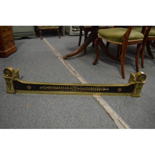 768 - A 19th century brass fender of Adam design with quivers and roundels 3' 10