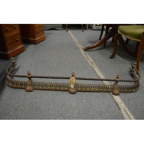 771 - A 19th century brass pierced fender with rope work, 4' 3