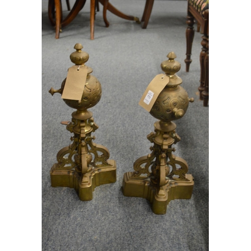 773 - A good pair of 19th century cast brass chenets with three scrolling supports and base, 1' 5