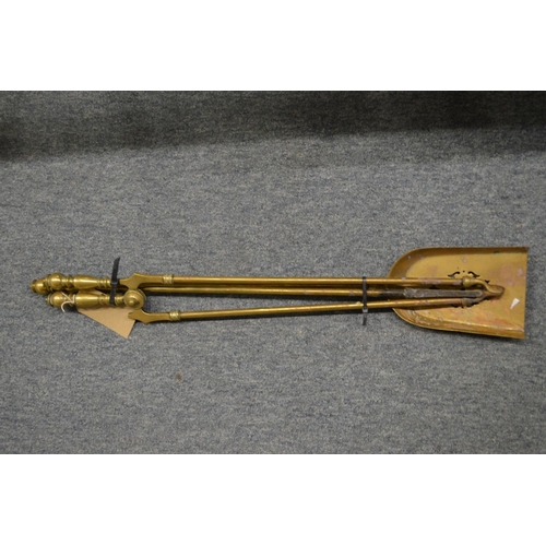 774 - A set of three Victorian brass fire irons.