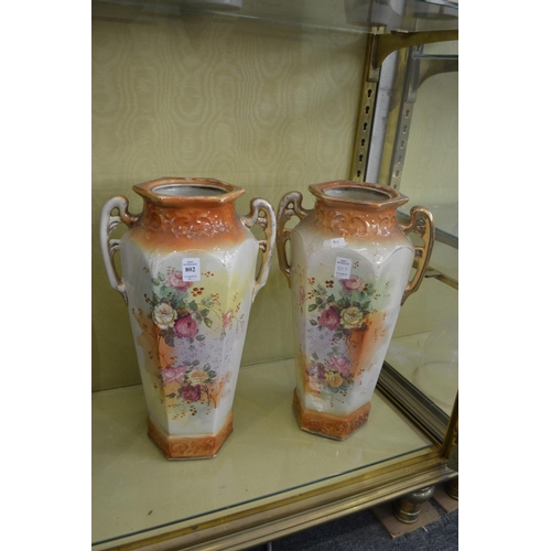 802 - A large pair of decorative vases.