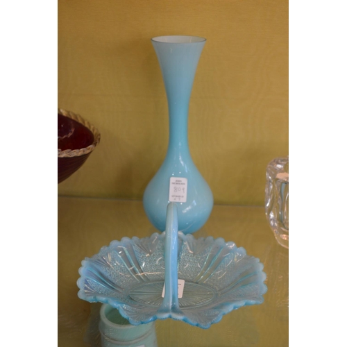 809 - A blue opaque glass basket and similar vase.