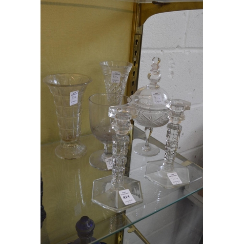 814 - A pair of candlesticks etc.