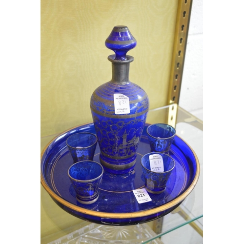 821 - Blue glass liqueur set.