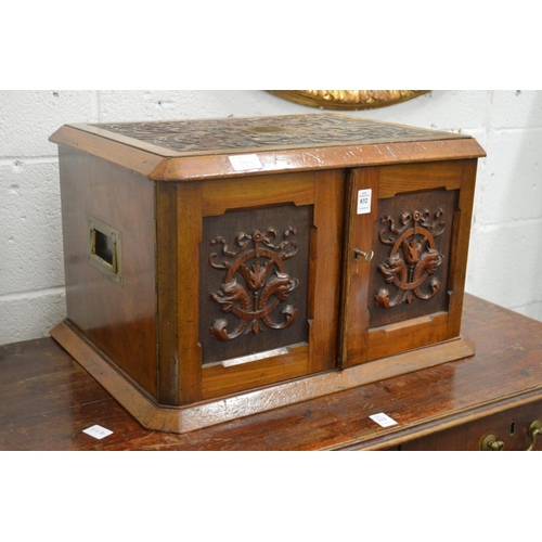 832 - A good Victorian carved walnut two door cutlery canteen or collectors cabinet, the pair of doors ope... 