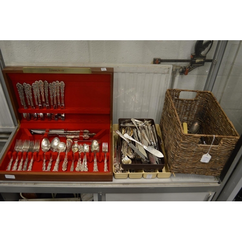 836 - A part canteen of cutlery and large quantity of plated flatware.