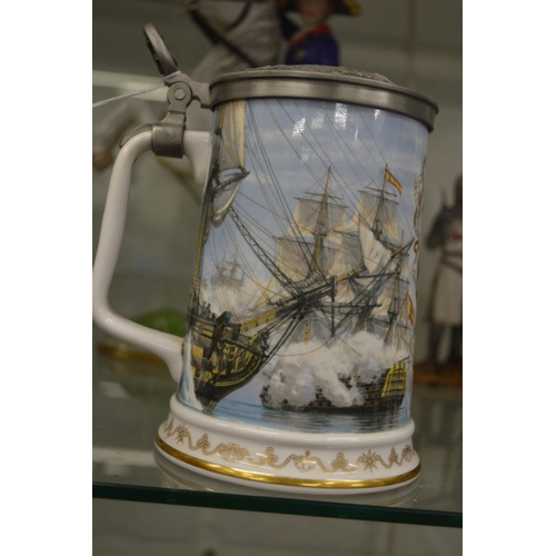 881 - A Royal Worcester tankard depicting Nelson's victory at Trafalgar.