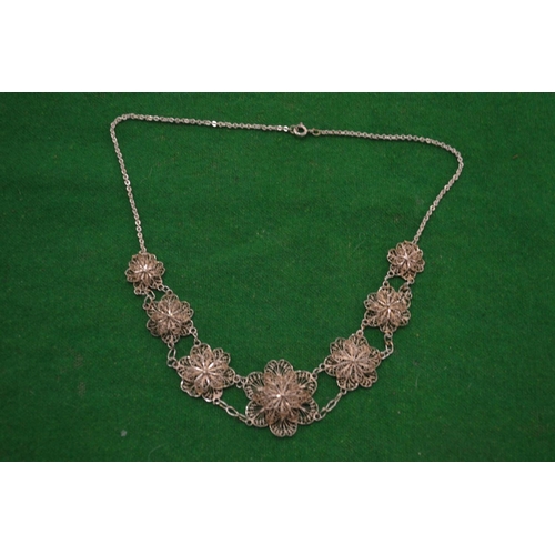 1025 - A filigree silver necklace.