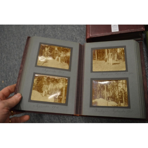 905 - A set of four photograph albums with contents.