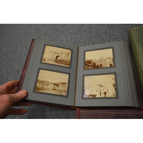 905 - A set of four photograph albums with contents.