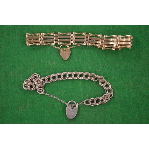 932 - A 9 carat gold gate bracelet and another bracelet.