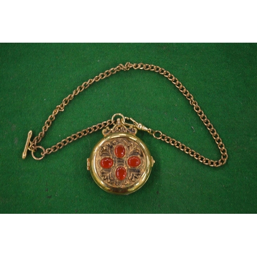 946 - Decorative pocket watch and chain.