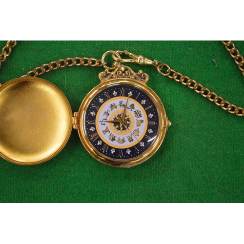 946 - Decorative pocket watch and chain.