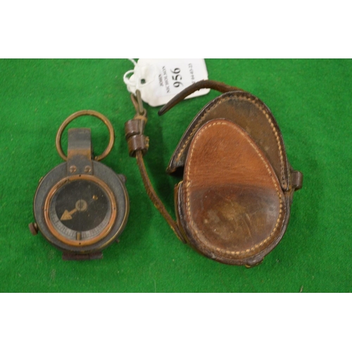 956 - A leather cased military compass.