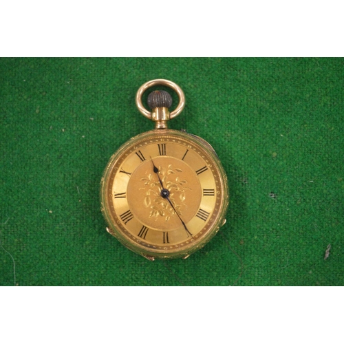 958 - A Ladies engraved gold pocket watch stamped 14k.