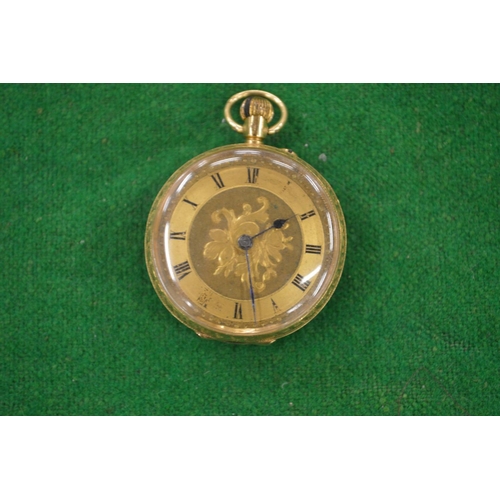 959 - A Ladies engraved gold pocket watch hallmarked 18 carat gold.