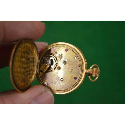 959 - A Ladies engraved gold pocket watch hallmarked 18 carat gold.