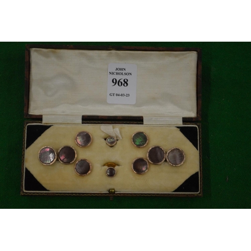 968 - A cased set of cufflinks and dress studs.