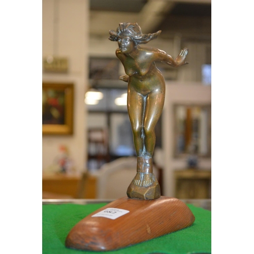 982 - A small art nouveau bronze figure of a female nude (repairs).