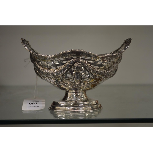 991 - A silver pierced pedestal basket.