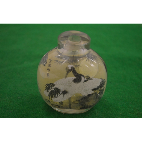 945 - A Chinese glass snuff bottle.