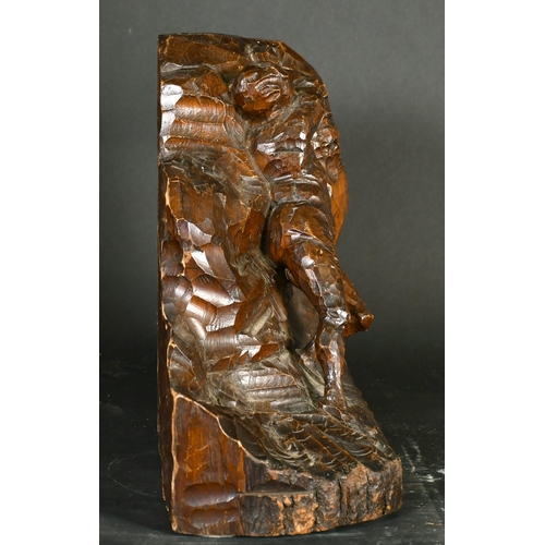 249 - A Continental wood carving of a nude male figure moving a rock bearing figureheads, circa 1900, sign... 