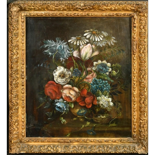 411 - 18th Century Continental School, a still life of mixed flowers and a bird nest, oil on panel, 13