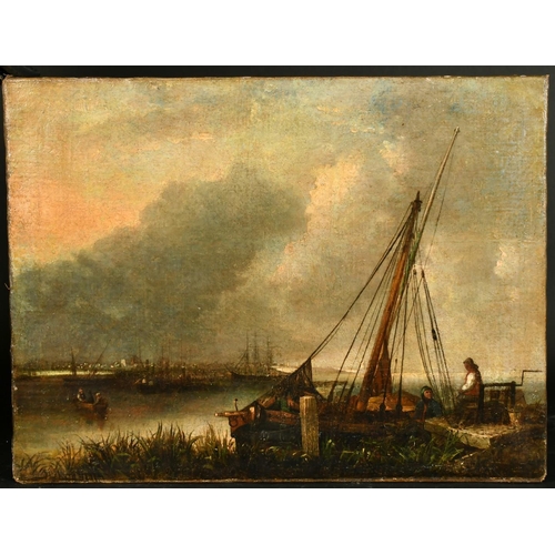 441 - 19th Century Dutch School, figures by a barge on a river with a town in the distance, oil on canvas,... 