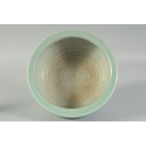 15 - A 19TH CENTURY CHINESE CELADON GLAZE PORCELAIN BOWL / CENSER, with carved floral decoration to the s... 