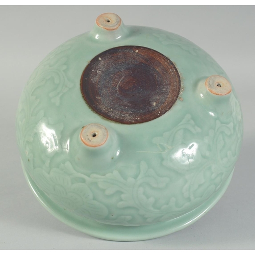 15 - A 19TH CENTURY CHINESE CELADON GLAZE PORCELAIN BOWL / CENSER, with carved floral decoration to the s... 