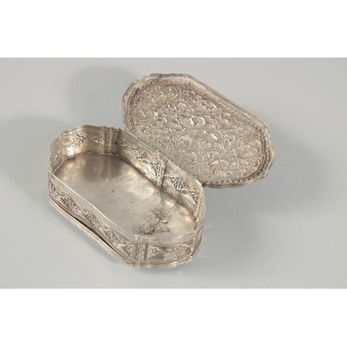 17 - A FINE 19TH CENTURY SRI LANKAN SILVER BOX, with embossed foliate decoration, weight 55g, 9cm x 5cm.