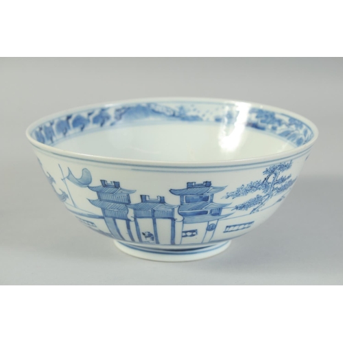 4 - AN EARLY 20TH CENTURY CHINESE BLUE AND WHITE PORCELAIN BOWL, painted with landscape scenes, with fou... 