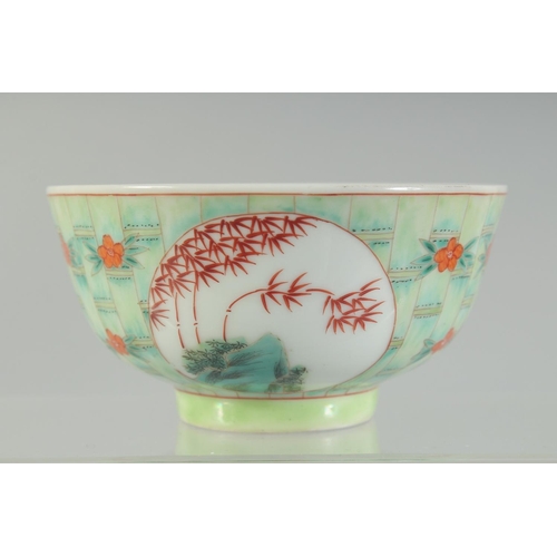 40 - A CHINESE COPPER RED AND GREEN PORCELAIN BOWL, with bamboo and foliate decoration, character mark to... 