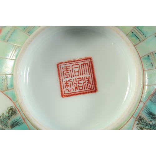 40 - A CHINESE COPPER RED AND GREEN PORCELAIN BOWL, with bamboo and foliate decoration, character mark to... 