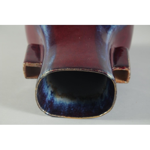 58 - A CHINESE FLAMBE GLAZE TWIN RING HANDLE VASE, 28cm high.