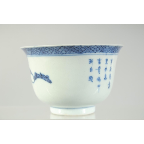 6 - A 19TH CENTURY CHINESE BLUE AND WHITE PORCELAIN TEA BOWL, painted with a bird and flora, the reverse... 