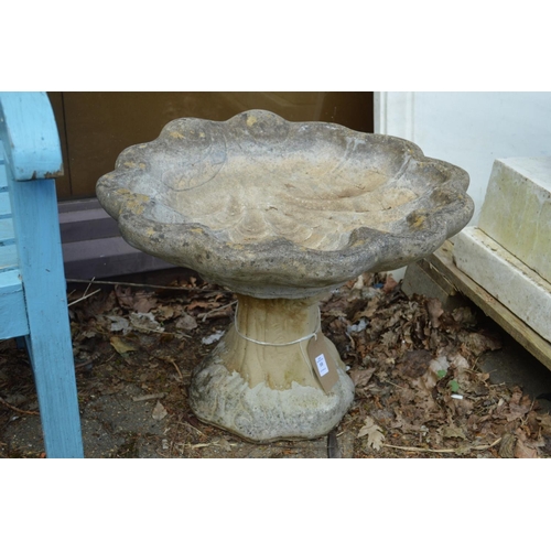 10 - A shell shaped bird bath.