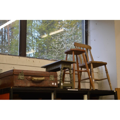 123 - An old leather suitcase, two stools and a chair.